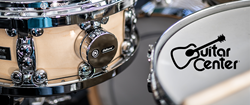 dialtune snare drum being played with Guitar Center logo