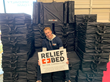 Hunter Smalling after building 
hundreds of Tri-Fold Relief Beds 
for city shelters.