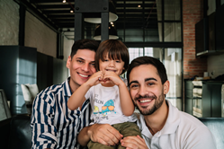 gay parents with their son