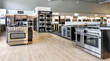 Coast Appliances showroom featuring top brands like Samsung, Frigidaire, LG, Bosch and more.
