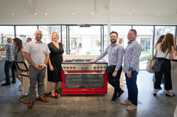 The Forza 48-inch pro-style gas range in red, now on display at PIRCH’s Laguna Design Center. Pictured (from left to right): Ignacio Corona Jr. (PIRCH), Kerri Malneritch (NEVE), Jason Walsh (NEVE) and Marco Guerzoni (Forza).
