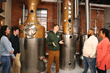 Owner Braeden Bumpers providing a tour of the distilling pro