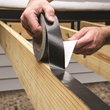 CAMO's self-adhesive butyl tape creates a waterproof membrane to protect wood deck framing against moisture. It self-seals around fasteners, blocking the pathway of water into wood.
