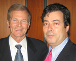 U.S. Senator Bill Nelson congratulates Seth Eisenberg on his election as Co-Chair of the National Writers Union's At-Large Chapter.