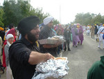 Sikhs distribute free food in the spirit of Seva