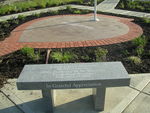 The completed Purple Heart Memorial, located in Harrison, Ohio, is surrounded by pavers and benches inscribed with the names of Purple Heart recipients.