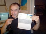 David Bakker poses with his Student Loan and UBC student card