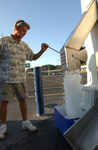 An Ice House America customer fills up his cooler with 20lbs of ice in 8 seconds.