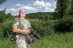 Lisa Loucks Christenson began shooting in the Whitewater Wildlife Management Area in April 2005 and has been there daily ever since-- no matter what.  Photo: John Weiss/ Post-Bulletin