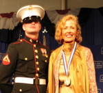Medalist Mira Zivkovich with military officer after receiving 2007 Ellis Island Medal of Honor 