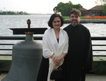 V. Rev.Djokan Majstorovic and his wife Miriana Majstorovic at the historical grounds of Ellis Island 