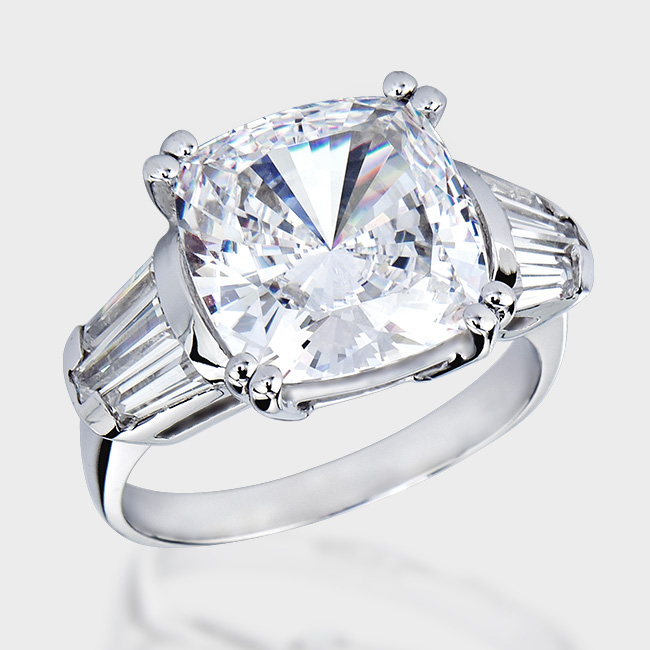 Gorgeous 7.0 carat cushion cut cubic zirconia engagement ring with three tapered baguette channel set on each side.