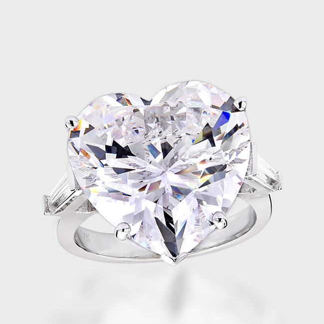 20.0 carat heart shape cubic zirconia with a single tapered baguette on each side, set in 14k white gold