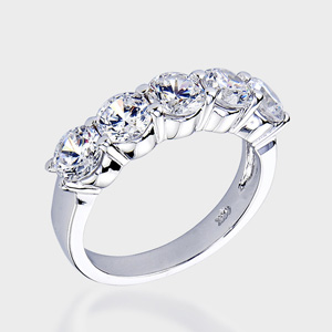 This high quality cubic zirconia wedding band features 5 brilliant round stones in a solid 14K white gold setting.