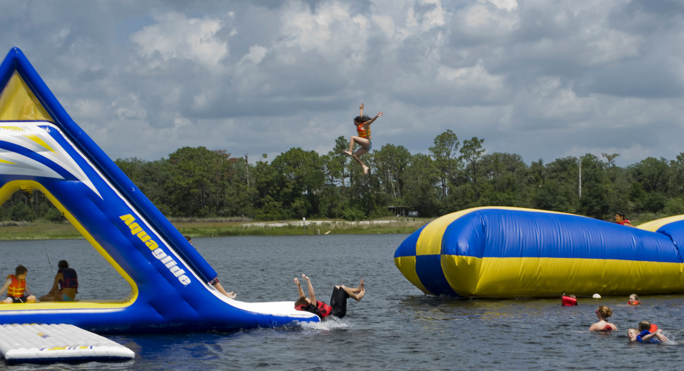 Kids Enjoying Fun on the lake at Summer Camp
