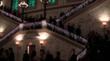 Guests descend the Grand Staircase of the Metropolitan Club to the Ballroom for the Ballo di Savoia,