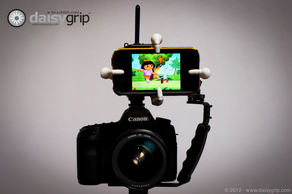 DaisyGrip™ and Bracket with iPhone® playing Dora the Explorer®