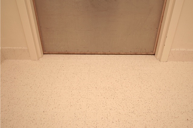 This floor has been refinished by Miracle Method and grout sealed.