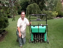 Lawn Aeration: Mike Taraborrelli, Lawn Care Manager at Giroud Tree and Lawn, uses an aeration machine to break through compacted soil and dense thatch allowing air and nutrients to reach the grass roots to stimulate root growth and build a healthy thick l