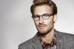Model wearing Warby Parker Quincy Eyeglasses in Brushed Opal