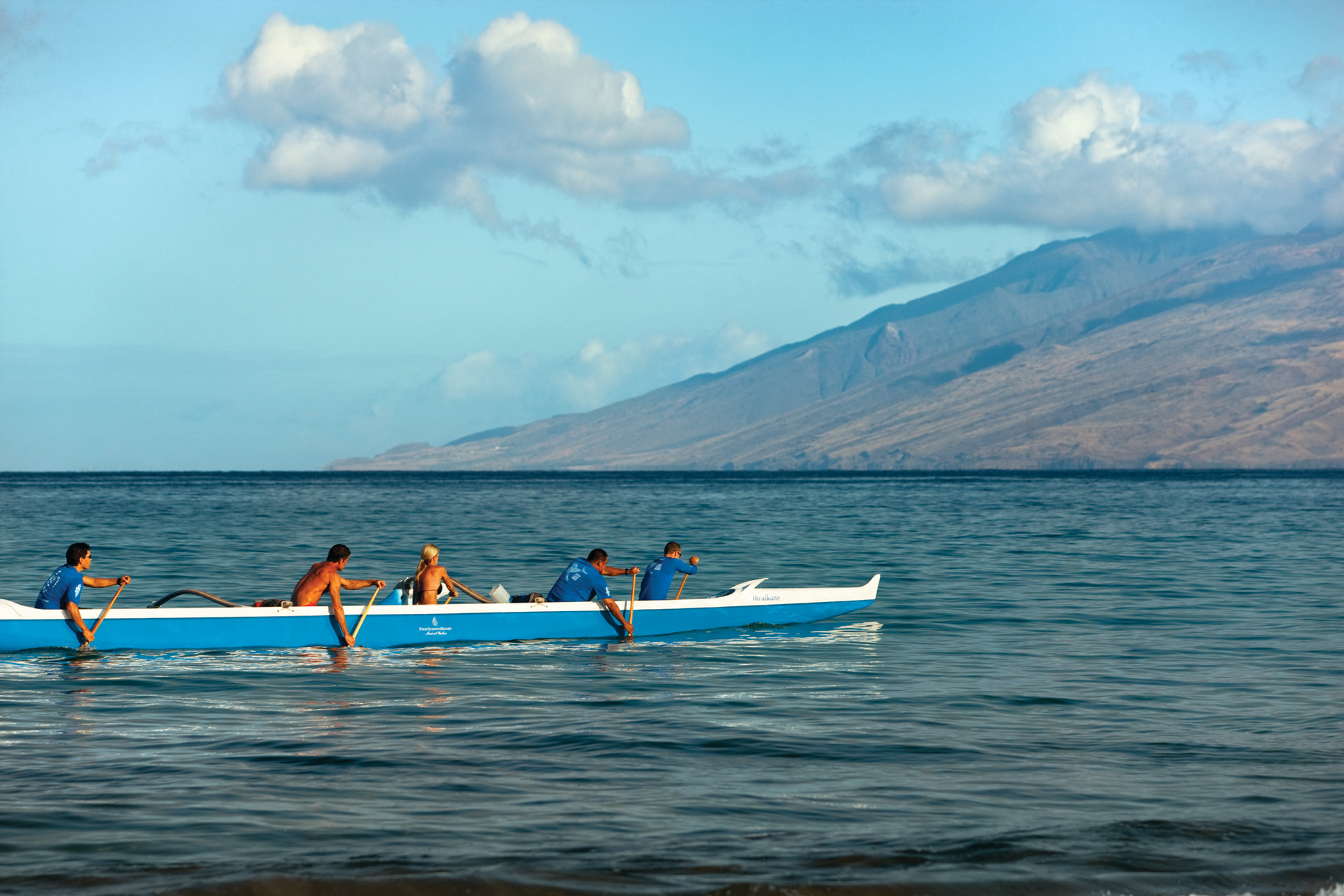 Four Seasons Resort Maui guests learn the history and the how-to of this Hawaiian paddling sport while keeping eyes and cameras peeled for whale sightings and point out the abundance of sea life.
