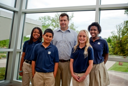 Christel House Academy Principal, Carey Dahncke, with students