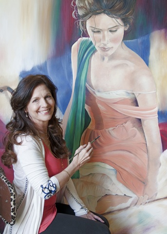 Artist Pomm with her painting "Serena"