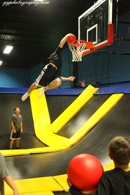 Slam dunk basketball on the trampoline is a huge hit with kids.