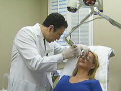 Dr. Simon Ourian performing laser skin resurfacing treatment