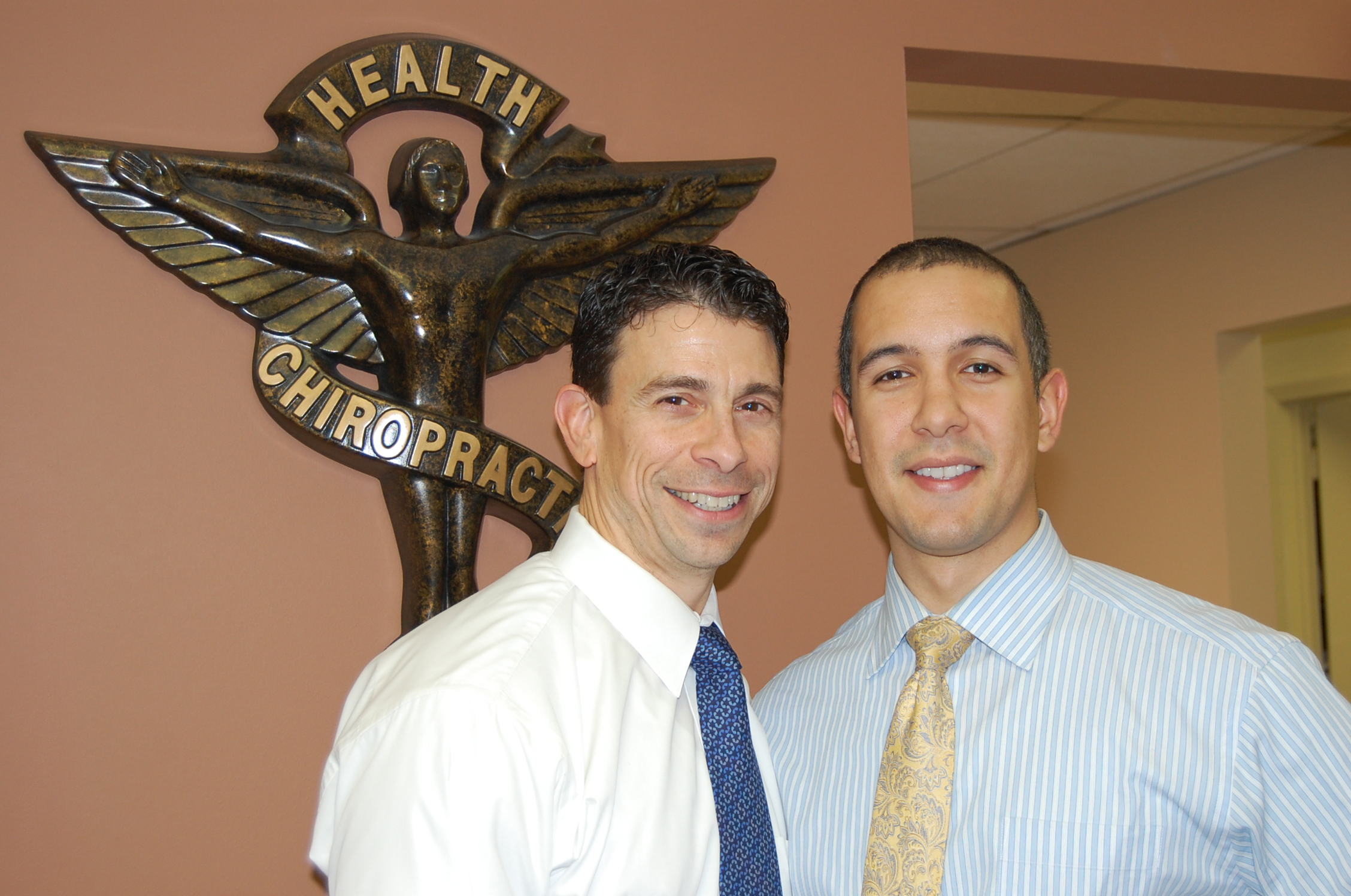 Dr. Michael Cocilovo and Dr. Gil Rodriguez of New City Chiropractic Center