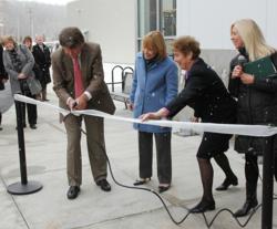 Hypertherm's Founder and New Hampshire Governor use a Powermax30 to cut the ribbon.