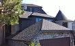 GAF Grand Canyon shingle with full Golden Pledge warranty and IB roof on the flat sections.