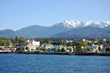 The Olympic Mountains, home to Olympic National Park, rise behind Port Angeles, Wash