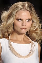 Bouncy, curly hair and flawless-looking skin for Spring 2013.