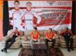 QNET officials and the Marussia F1 Team Drivers at a press conference after the event