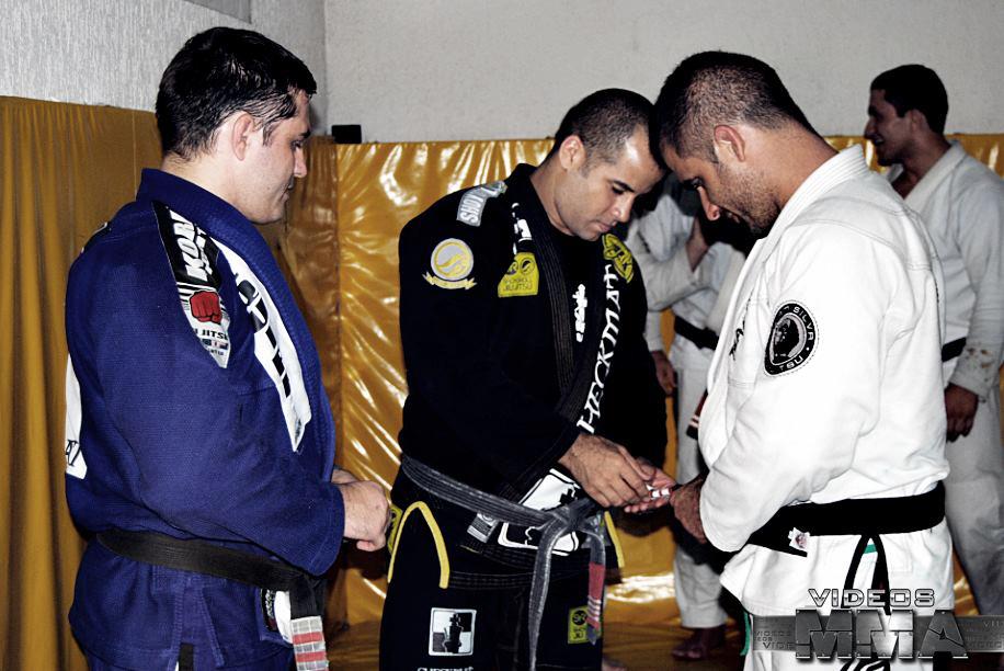 Sergio Silva receiving his third stripe from Master Leonardo Vieira