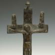 Bronze cross shows the converted still practiced native religion