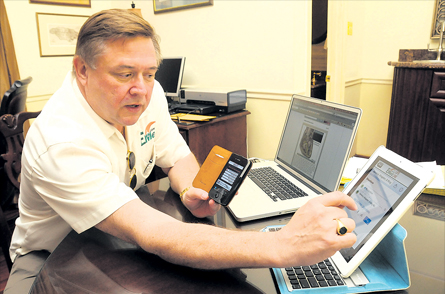 Boise shows the EMED video telemedicine technology at a demonstration Monday to a group of Jamaican physicians,that will facilitate the referral of Jamaican patients to HEALTH CITY CAYMAN ISLANDS