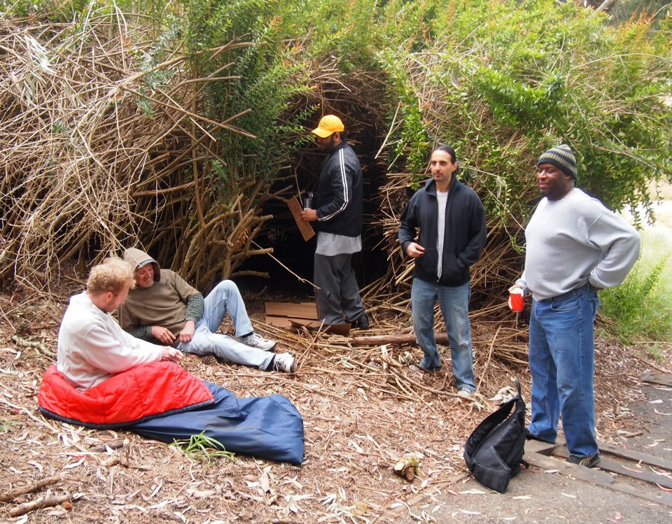 The homeless guys get ready to film their encampment.