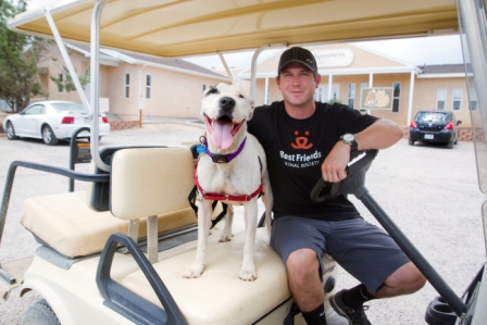 NASCAR driver Michael Annett tools around Best Friends Animal Sanctuary with adoptable dog Yuma.