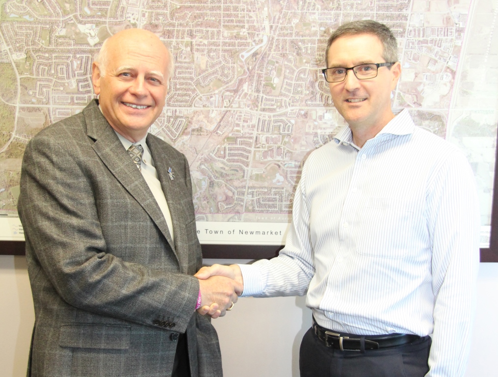 Mayor of Newmarket, Tony Van Bynen congratulates Trevor Van Nest, Owner/Founder of York Region Money Coaches, on his recent national press coverage.