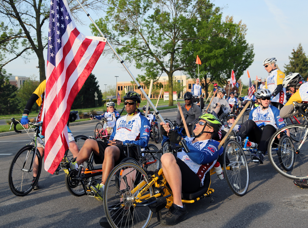 Riders prepare for the start of the 2013 Face of America ride in Frederick, Maryland. Photograph by Richard Rhinehart.