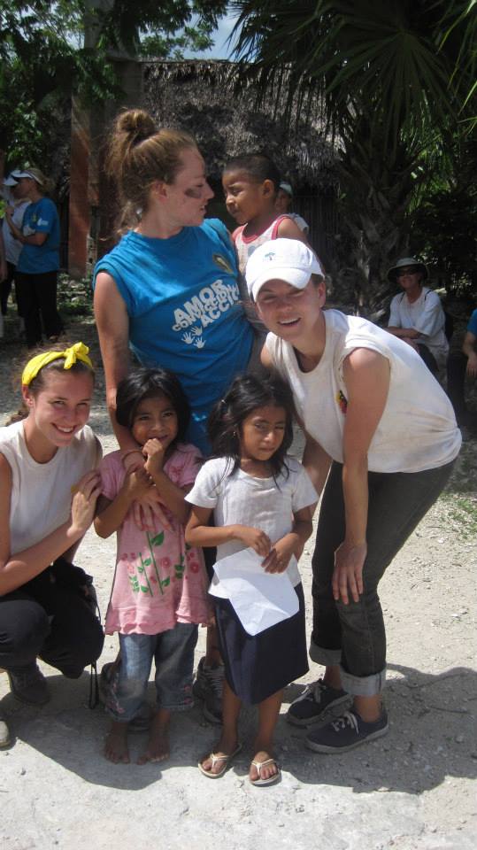 Gabby Diamond, Everest alumnus and Orland Park native, and Rose Maher, teacher at Everest, enjoy the young participants in the "Kids Camp" in Nuevo Durango, Mexico