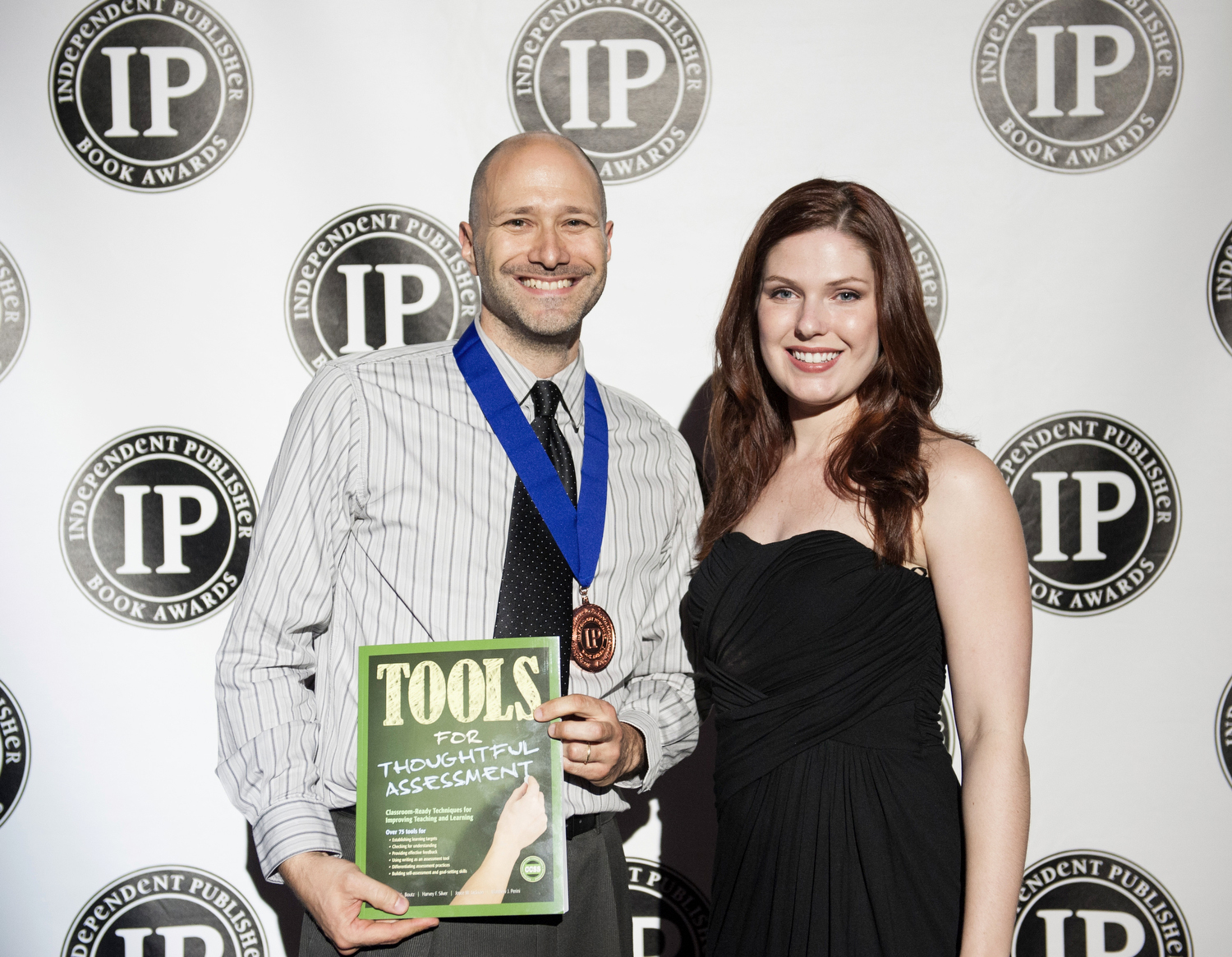 Co-author of Tools for Thoughtful Assessment Matthew Perini accepting the Bronze Award in the Education 1 category at the 17th Annual IPPY Awards, New York, NY, May 2013.