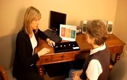 Award-Winning Charleston Audiologist Dr. Mary Anne Larkin with Patient