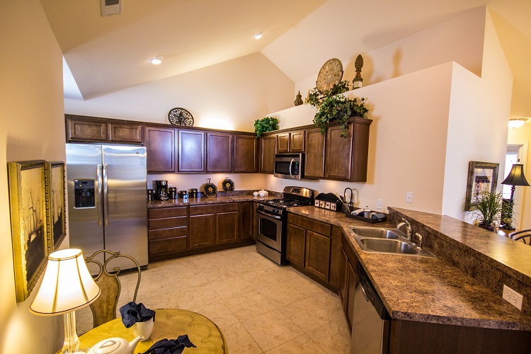 Spacious kitchens with plenty of cabinets and countertop space.