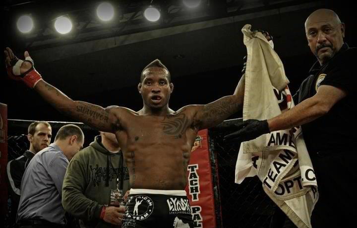 Bubba Jenkins getting his hand raised after winning is last fight to grow his record to 3-0
