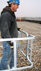 The A-Mezz Roof Hatch Railing includes a self-closing gate for maximum worker safety - photo