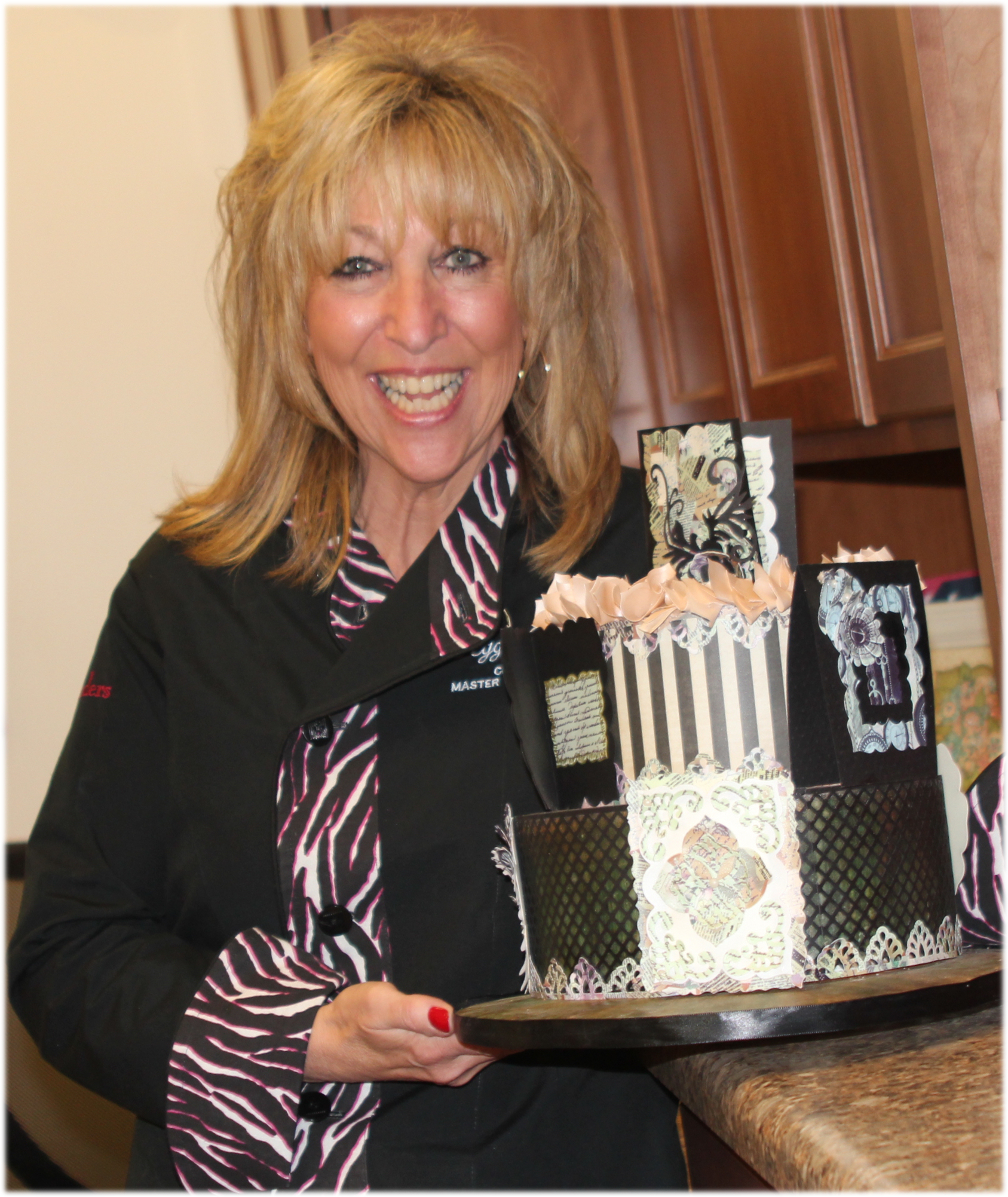 Cake Artist, Peggy Tucker, CMSA with a cake designed in Icing Images Premium Icing Sheets