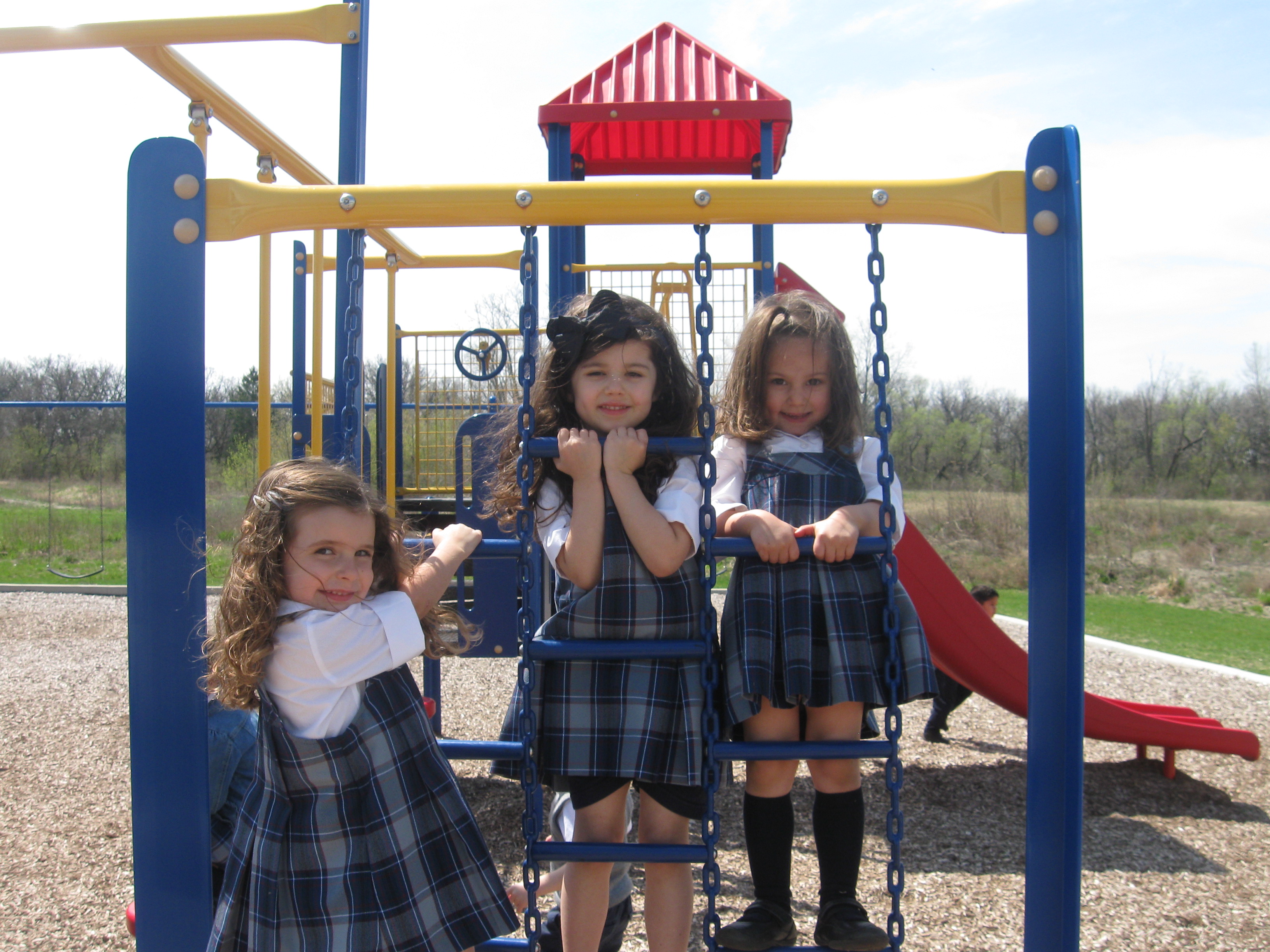 Everest Academy preschoolers soak in the sunshine & fresh air out on the playground